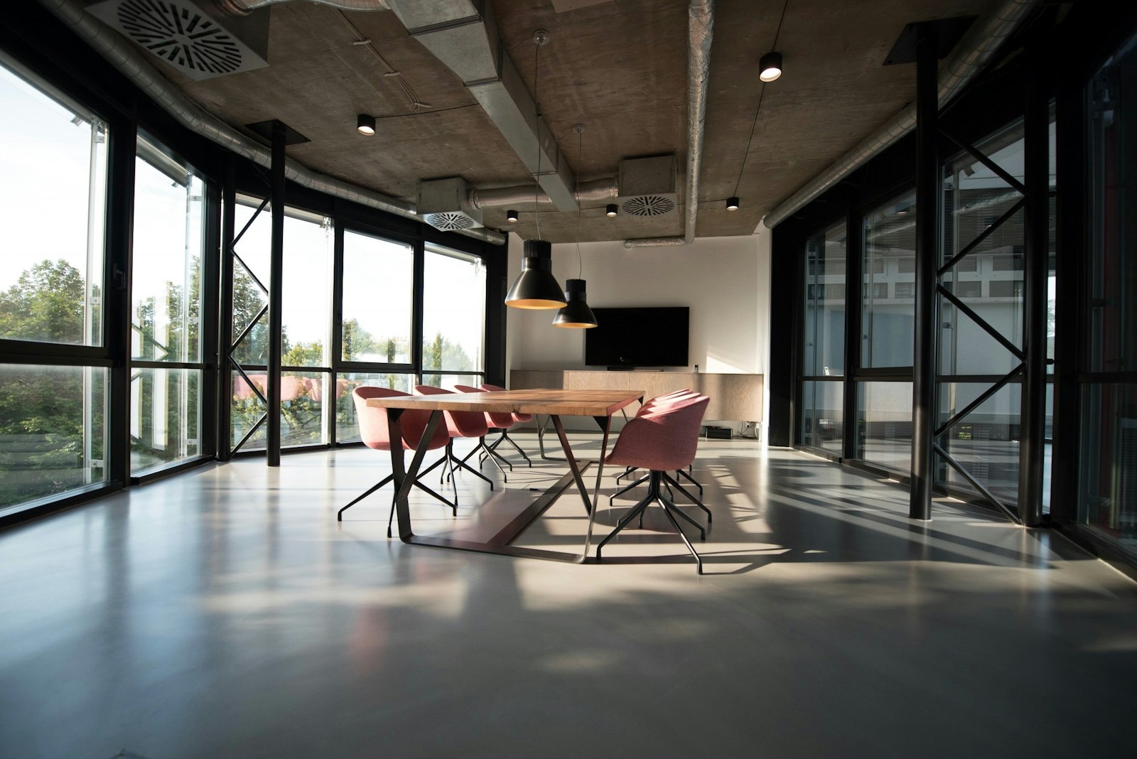 Bright studio workspace with desks and natural light