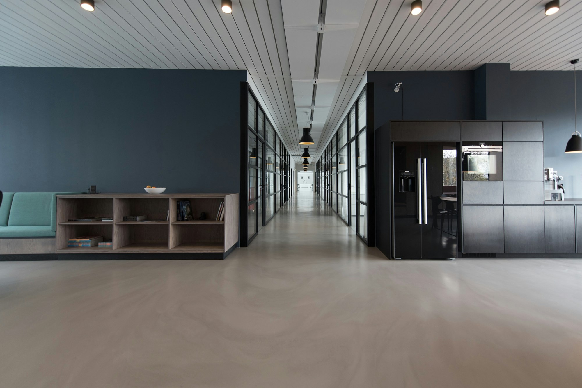 Modern studio corridor and workspaces